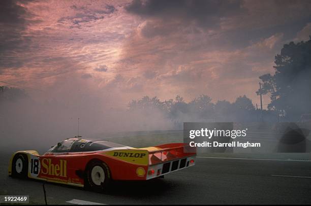 The Porsche 962 driven by Schappen, Bob Wolleck, Vern and Van der Merwe rounds the Arnage Bend during the Le Mans 24 Hour Race at the Circuit de la...