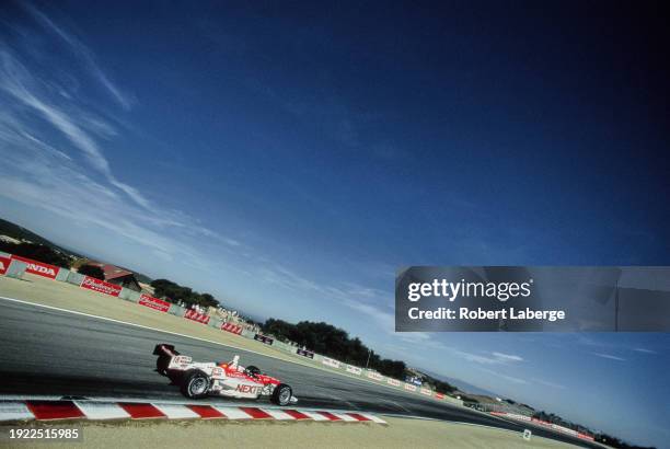 Scott Dixon from New Zealand drives the PacWest Racing Reynard 01i Toyota RV8E during practice for the Championship Auto Racing Teams 2001 FedEx...