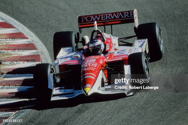 Scott Dixon from New Zealand drives the PacWest Racing Reynard 01i Toyota RV8E during practice for the Championship Auto Racing Teams 2001 FedEx...