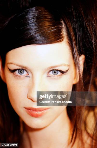 Model Caitriona Balfe backstage at the Moschino Spring 2003 Ready to Wear Runway Show on September 29 in Milan, Italy.
