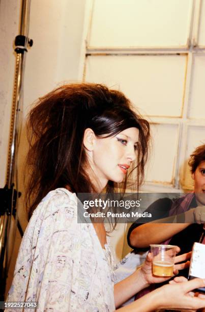 Model Caitriona Balfe backstage at the Moschino Spring 2003 Ready to Wear Runway Show on September 29 in Milan, Italy.