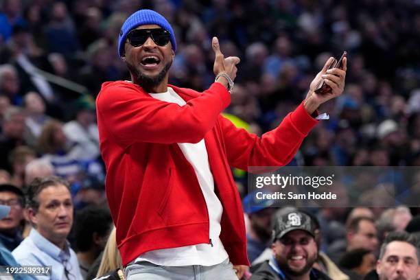 Tee Morant, father of Ja Morant of the Memphis Grizzlies, celebrates during the second half of the game against the Dallas Mavericks at American...