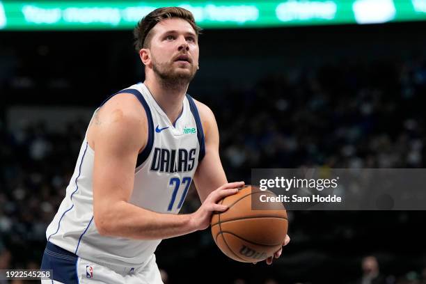 Luka Doncic of the Dallas Mavericks prepares to take a free throw during the first half against the Memphis Grizzlies at American Airlines Center on...