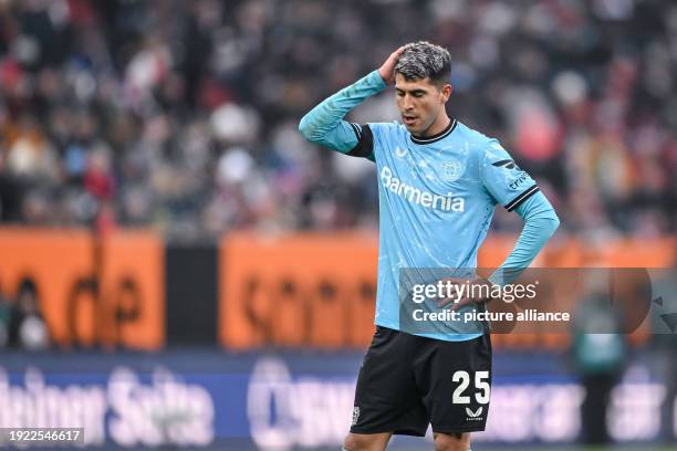 January 2024, Bavaria, Augsburg: Soccer: Bundesliga, FC Augsburg - Bayer Leverkusen, Matchday 17, WWK-Arena. Leverkusen's Exequiel Palacios reacts...