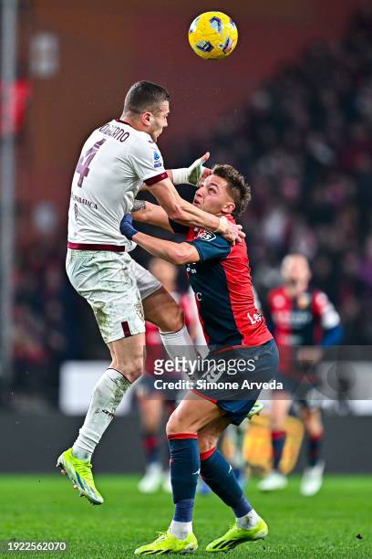 Alessandro Buongiorno of Torino and Mateo Retegui of Genoa vie for the ball during the Serie A TIM match between Genoa CFC and Torino FC at Stadio...