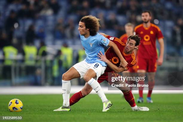 Matteo Guendouzi of SS Lazio battles for possession with Edoardo Bove of AS Roma during the Coppa Italia match between SS Lazio and AS Roma at Stadio...