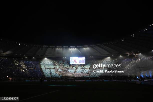 Fans of SS Lazio display a tifo prior to the Coppa Italia match between SS Lazio and AS Roma at Stadio Olimpico on January 10, 2024 in Rome, Italy.