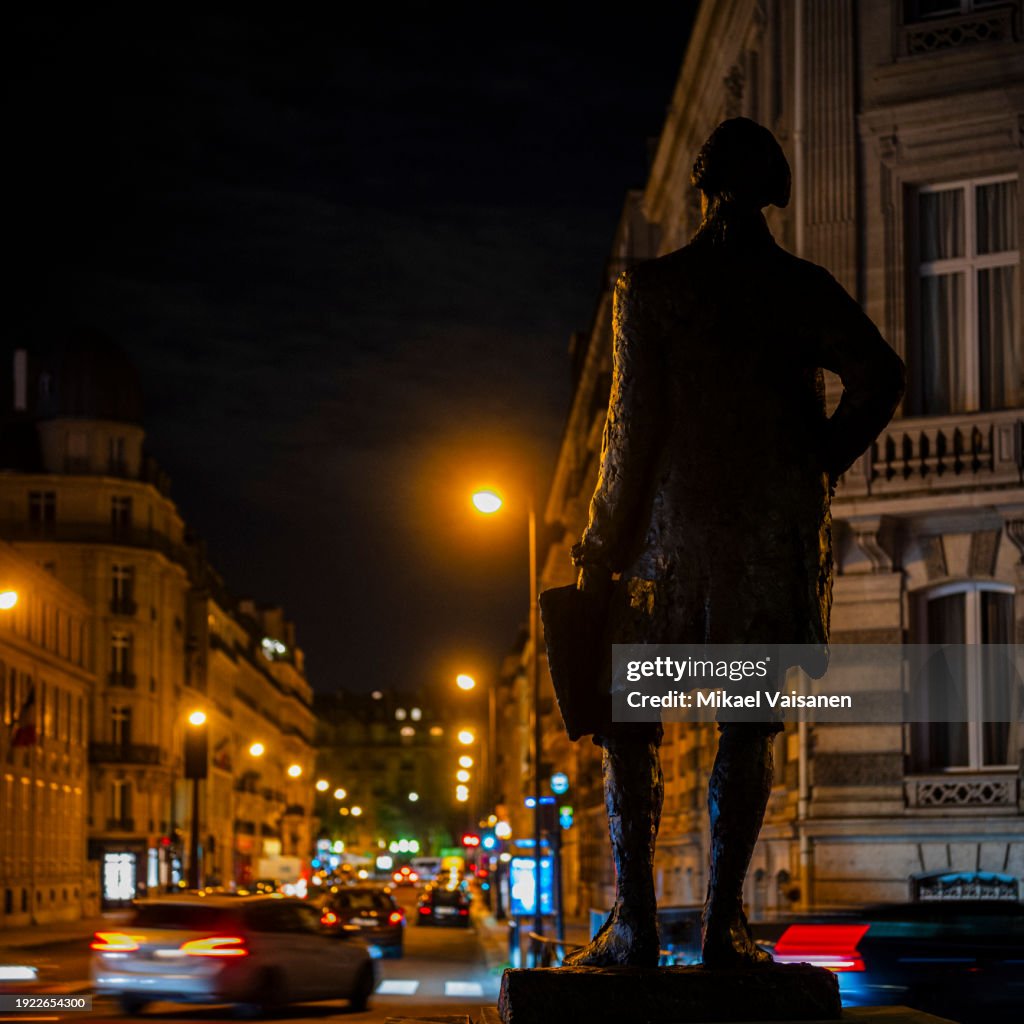 Statue of Thomas Jefferson by sculptor Jean Cardot revealed in 2006. Close to the Musee d'Orsay at night in Paris
