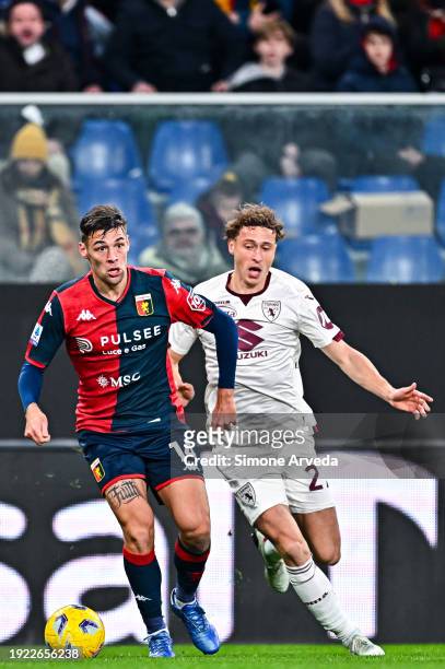 Alessandro Vogliacco of Genoa and Mergim Vojvoda of Torino vie for the ball during the Serie A TIM match between Genoa CFC and Torino FC at Stadio...