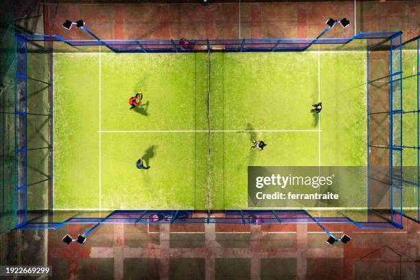 overhead view of a padel tennis match - racket sport stock pictures, royalty-free photos & images