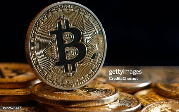 In this photo illustration, a visual representation of the digital cryptocurrency Bitcoin is displayed on January 10, 2024 in Paris, France. The...