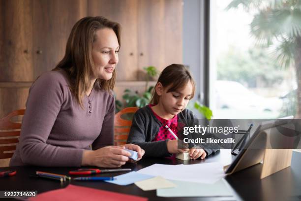 Child Getting Paper 172 Older Woman Cutting Paper Stock Photos, High-Res Pictures, and ...