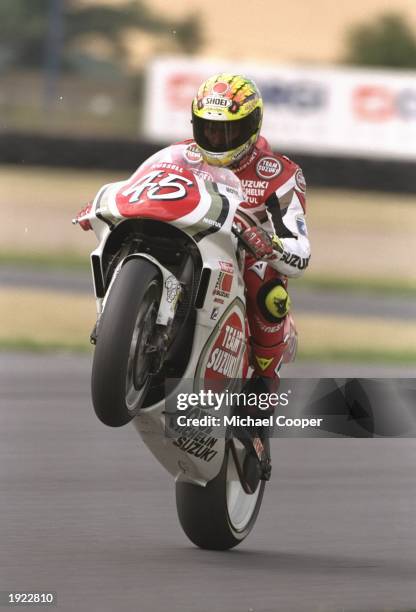 Scott Russell of the USA wheelies on his Suzuki during practice for the British Grand Prix at the Donington Park circuit in England. A bad practise...