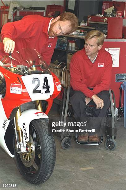 Marlboro Team Boss Wayne Rainey of the USA checks out a motorcycle before the Japanese Grand Prix at the Suzuka circuit in Japan. \ Mandatory Credit:...