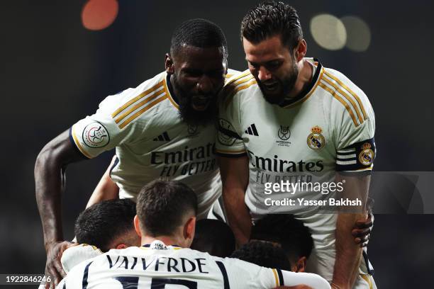 Antonio Ruediger and Nacho Fernandez of Real Madrid celebrate after teammate Ferland Mendy scored their team's second goal during the Super Copa de...