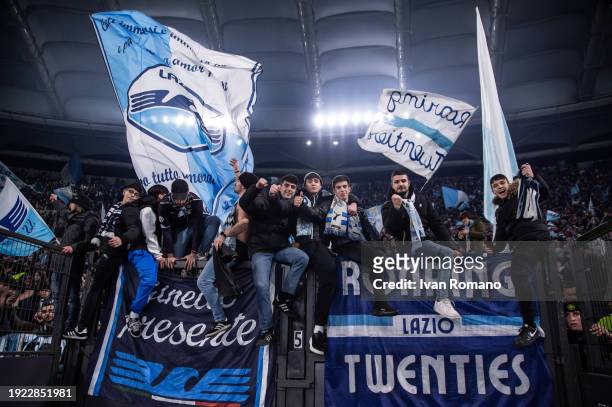 The SS Lazio supporters celebrate after the Coppa Italia quarter-finals match between SS Lazio and AS Roma at Stadio Olimpico on January 10, 2024 in...