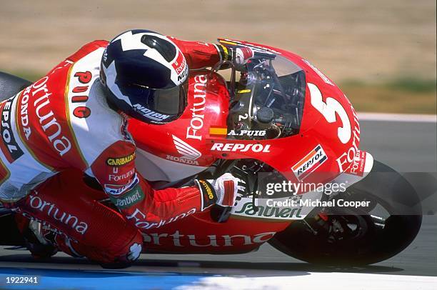 Alberto Puig of Spain leans into a corner on his Honda during the Spanish Grand Prix at the Jerez circuit in Spain. Puig finished in first place. \...