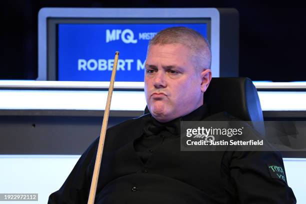 Robert Milkins of England looks on in his first round match against Mark Selby of England during day four of the MrQ Masters Snooker 2024 at...