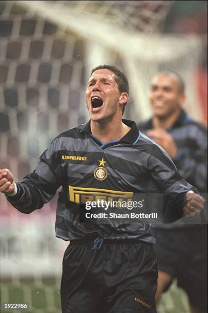 Diego Simeone of Inter Milan celebrates his goal during the UEFA Cup third round second leg match against Strasbourg at the Giuseppe Meazza Stadium...