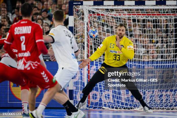 Andreas Wolff of Germany saves a ball during the Men's EHF Euro 2024 preliminary round match between Germany and Switzerland at Merkur Spiel-Arena on...