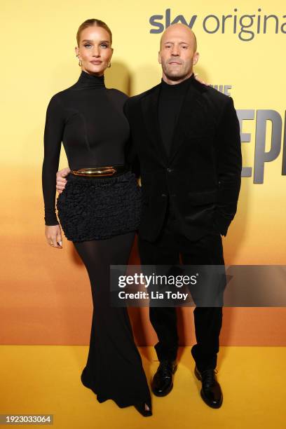 Rosie Huntington-Whiteley and Jason Statham attend the UK premiere of "The Beekeeper" at Vue Leicester Square on January 10, 2024 in London, England.