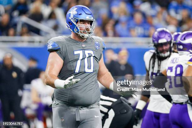 Dan Skipper of the Detroit Lions looks on before a play second half of a game against the Minnesota Vikings at Ford Field on January 07, 2024 in...