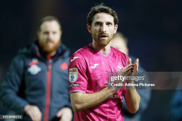 Joe Allen of Swansea City applauds away supporters after the Sky Bet Championship match between Birmingham City and Swansea City at St Andrews's...