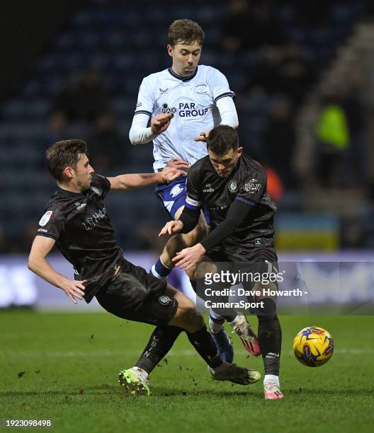 Preston North End's Mads Frokjaer-Jensen battles with Bristol City's Jason Knight and Joe Williams during the Sky Bet Championship match between...