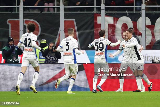 Teun Koopmeiners of Atalanta BC celebrates scoring his team's second goal from a penalty with teammates during the Coppa Italia match between AC...