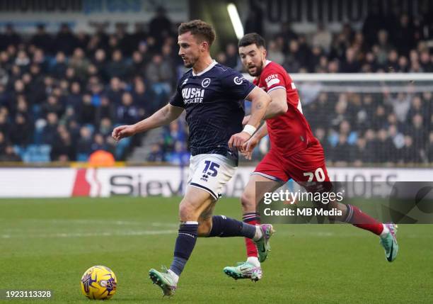 Joe Bryan of Millwall under pressure from Finn Azaz of Middlesbrough during the Sky Bet Championship match between Millwall and Middlesbrough at The...