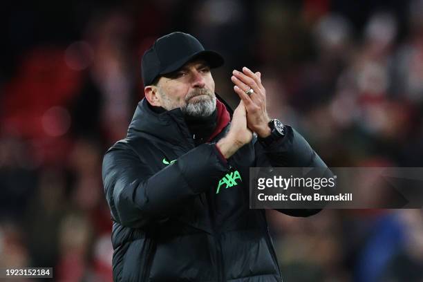 Juergen Klopp, Manager of Liverpool, applauds the fans after the team's victory in the Carabao Cup Semi Final First Leg match between Liverpool and...