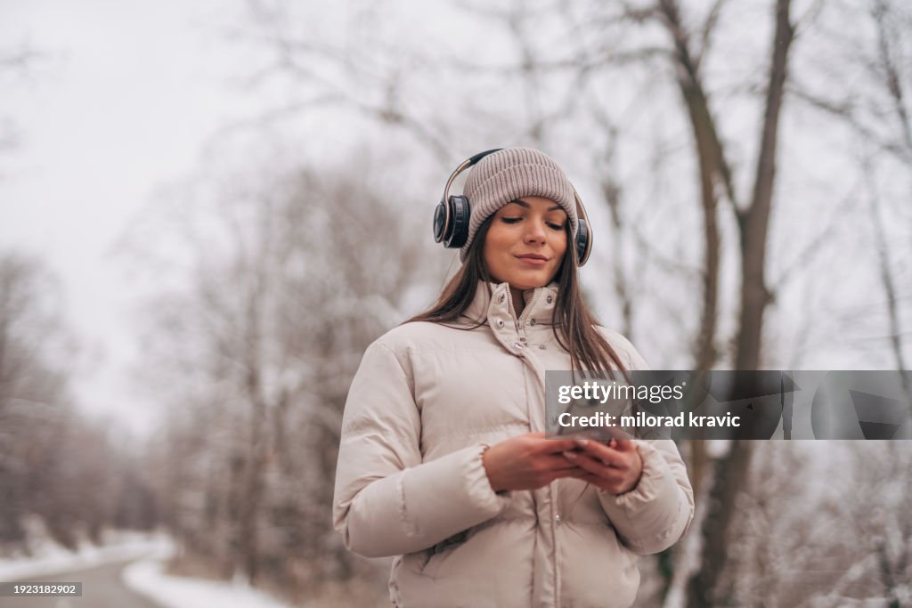 Pretty girl holding a smartphone