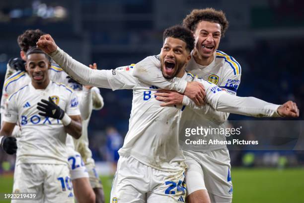 Georginio Rutter of Leeds United celebrates scoring with team mate Ethan Ampadu during the Sky Bet Championship match between Cardiff City and Leeds...