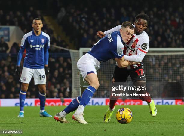 George Edmundson of Ipswich challenges Abdoullah Ba of Sunderland during the Sky Bet Championship match between Ipswich Town and Sunderland at...