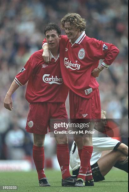 Robbie Fowler and Steve McManaman of Liverpool celebrate a goal during the FA Carling Premiership match against Derby County at Pride Park in Derby,...