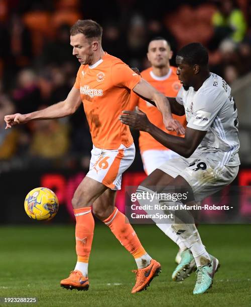 Blackpool's Jordan Rhodes vies for possession with Exeter City's Cheick Diabate during the Sky Bet League One match between Blackpool and Exeter City...