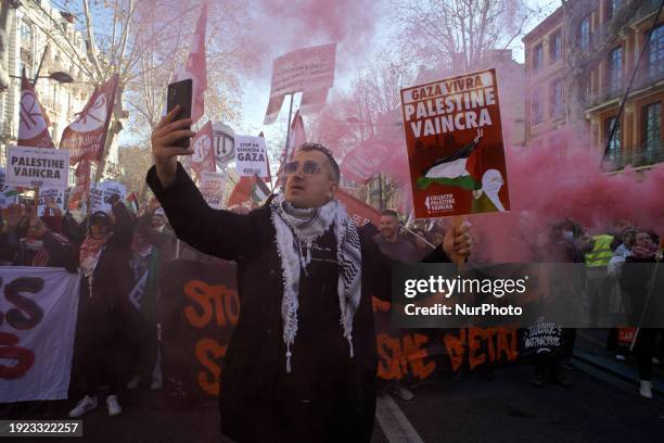 Protester is taking a picture of himself during a demonstration. Hundreds of people are demonstrating in Toulouse, France, on January 13 in support...