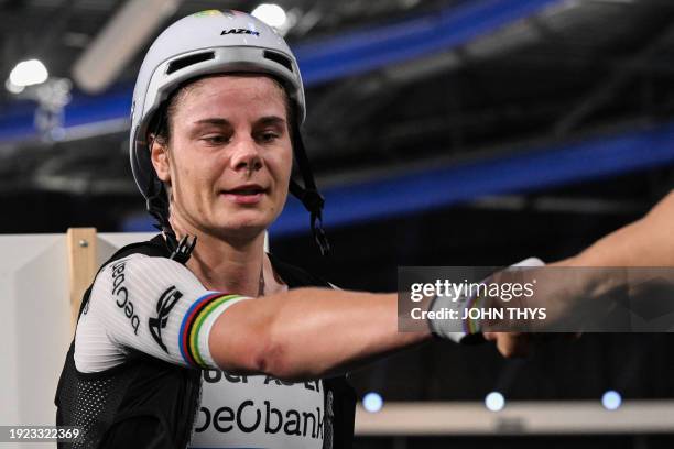 Belgium's Lotte Kopecky celebrates after winning in the Women's Points race during the fourth day of the UEC European Track Cycling Championships at...