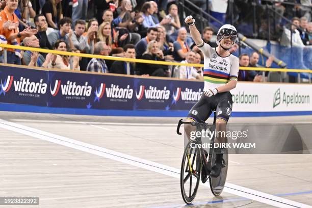 Belgian Lotte Kopecky celebrates after winning the final of the women's points race at the 2024 UEC Track Elite European Championships in Apeldoorn,...