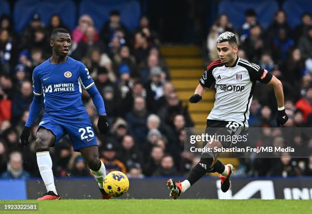 Moises Caicedo of Chelsea and Andreas Pereira of Fulham during the Premier League match between Chelsea FC and Fulham FC at Stamford Bridge on...