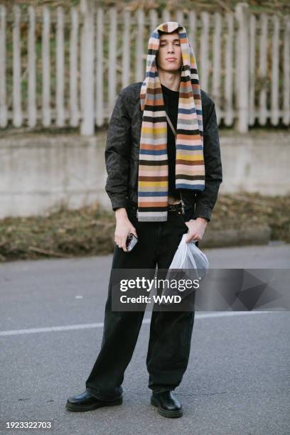 Street style at Milan Men's Fashion Week on January 12, 2024 in Milan, Italy.