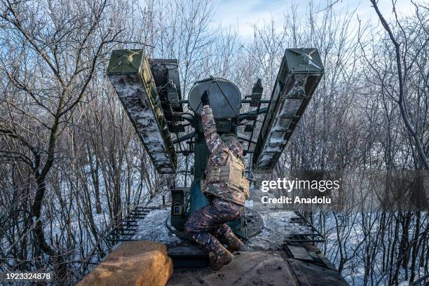 Ukrainian soldier prepares an anti-aircraft vehicle at the Bakhmut frontline, in Donetsk Oblast, Ukraine on January 13, 2024. Drone and air strikes...