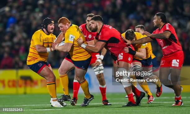 Belfast , United Kingdom - 13 January 2024; Steven Kitshoff of Ulster is tackled by Emmanuel Meafou of Toulouse during the Investec Champions Cup...
