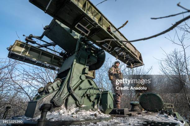 Ukrainian soldier prepares an anti-aircraft vehicle at the Bakhmut frontline, in Donetsk Oblast, Ukraine on January 13, 2024. Drone and air strikes...