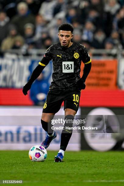 Jaden Sancho of Borussia Dortmund runs with the ball during the Bundesliga soccer match between SV Darmstadt 98 and Borussia Dortmund at...