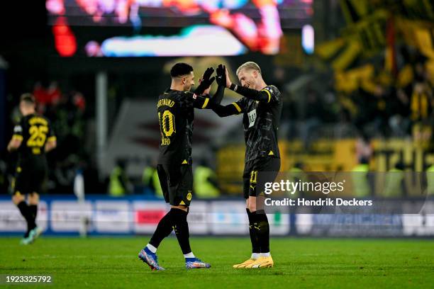 Jaden Sancho of Borussia Dortmund and Marco Reus of Borussia Dortmund react during the Bundesliga soccer match between SV Darmstadt 98 and Borussia...