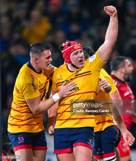 Belfast , United Kingdom - 13 January 2024; Tom Stewart of Ulster celebrates with James Hume, left, after scoring their side's first try during the...