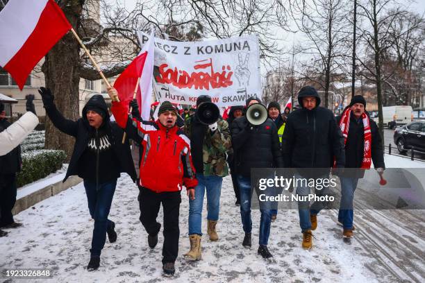 People supporting right-wing opposition Law and Justice party attend 'Free Poles Protest' in Warsaw, Poland on January 11, 2024. The previous...