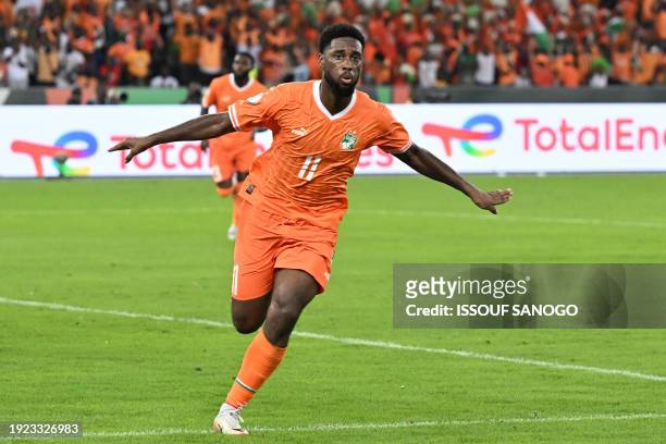 Ivory Coast's forward Jean Philippe Nils Stephan Krasso celebrates scoring his team's second goal during the Africa Cup of Nations 2024 group A...