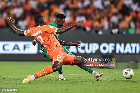 Ivory Fights Ivory Coast's defender Ousmane Diomande fights for the ball with ...